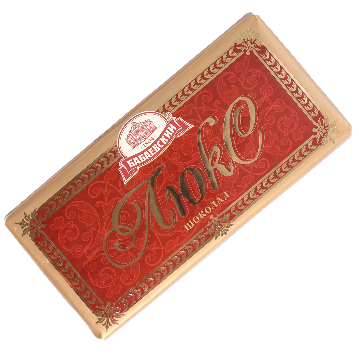 Babaevsky Lyuks chocolate bar in a red-and-gold wrapper with ornate scrollwork, gold script and a white brand crest.