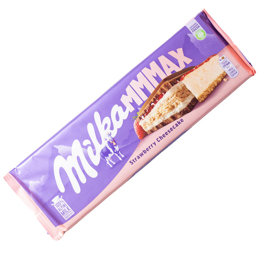 Milka MMMAX Strawberry Cheesecake milk chocolate bar, 10.5 oz — purple and pink wrapper with “MMMAX” text and strawberry cheesecake image.