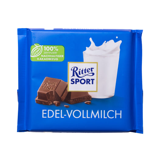 Ritter Sport Fine Milk Chocolate Bar (Edel-Vollmilch), 3.5 oz — blue wrapper with Ritter Sport logo, milk splash graphic, and chocolate pieces on a white background.