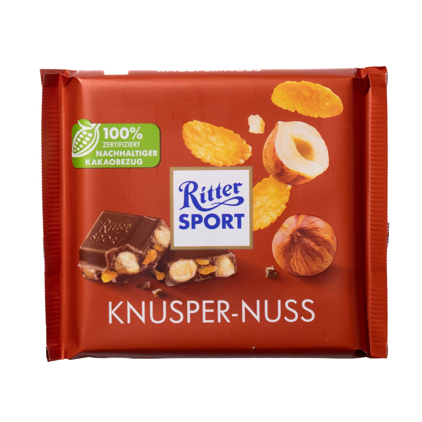 Ritter Sport Whole Hazelnuts with Cornflakes Milk Chocolate Bar, 3.5oz — square bar in reddish-brown wrapper with hazelnuts and cornflakes pictured on the front.