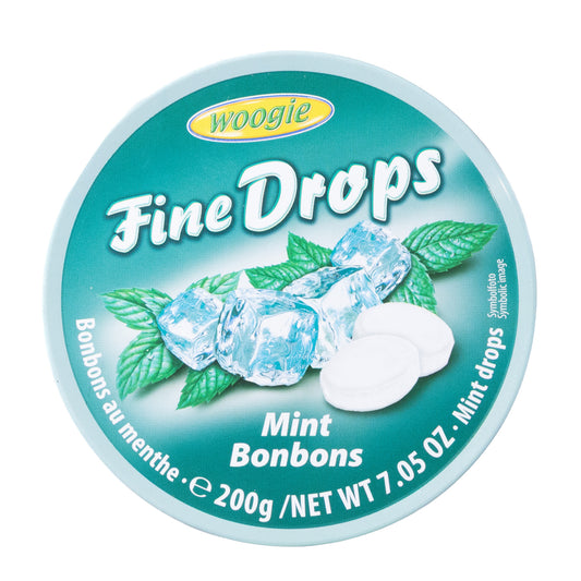 Woogie Fine Drops mint hard candy tin, 7.05 oz, top view of green lid with mint leaves and candies shown